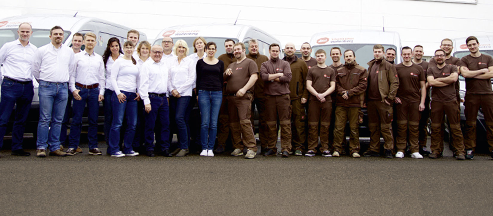 Ein Gruppenbild der Wollenberg Sicherheits- und Fenstertechnik GmbH.